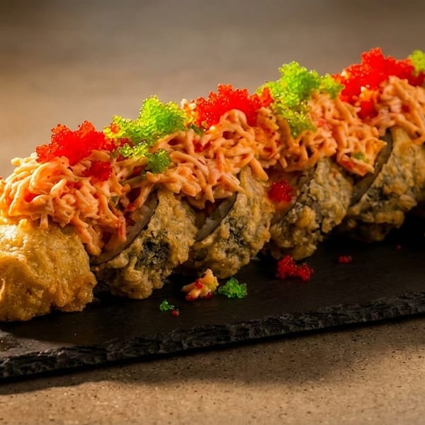 Deep-fried sushi rolls topped with spicy crab, red and green tobiko, served with wasabi and ginger.